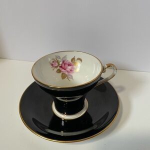 Elegant Black and White Floral Teacup and Saucer Set